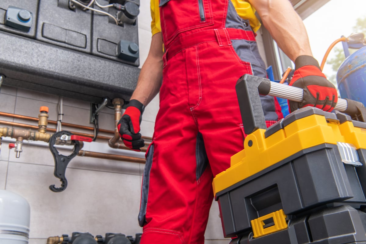 HVAC Technician with His Toolbox